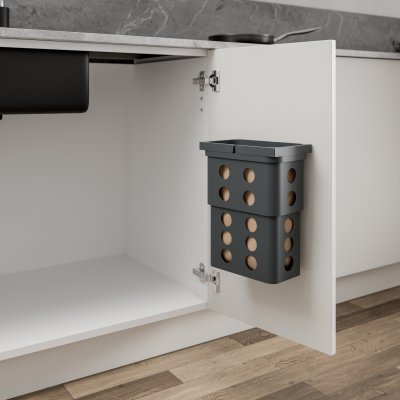 Praktisk mörkgrå komposthink med ventilationslock och väggbeslag – idealisk under diskbänken.