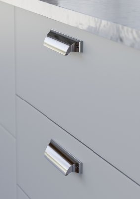 Trani skålhandtag rostfri look monterat på vit lucka